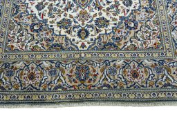Full view of 2000s Kashan rug from Iran / Persia, 304 × 195 cm in Beige tones