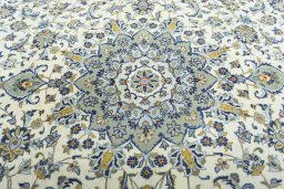 Central medallion detail of 2000s Kashan rug from Iran / Persia