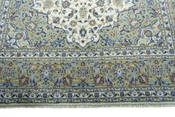Full view of 2000s Kashan rug from Iran / Persia, 308 × 201 cm in Beige tones