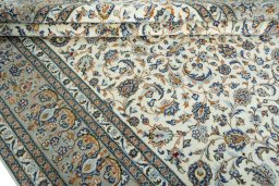 Close-up detail of 2000s Kashan rug from Iran / Persia showing Wool weave
