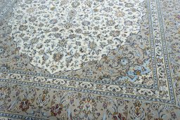 Close-up detail of New Kashan rug from Iran / Persia showing Wool weave