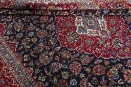 Close-up detail of 2000s Kashan rug from Iran / Persia showing Wool weave