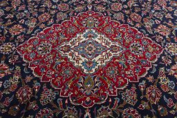 Central medallion detail of 2000s Kashan rug from Iran / Persia