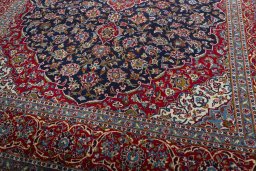 Close-up detail of 2000s Kashan rug from Iran / Persia showing Wool weave