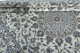 Close-up detail of 2000s Kashan rug from Iran / Persia showing Wool weave