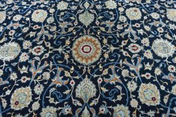 Central medallion detail of 2000s Kashan rug from Iran / Persia