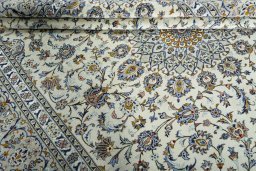 Close-up detail of 2000s Kashan rug from Iran / Persia showing Wool weave