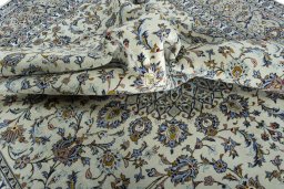 Surface texture of 2000s Kashan rug with natural Wool and intricate pattern