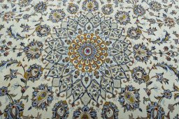 Central medallion detail of 2000s Kashan rug from Iran / Persia