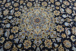 Central medallion detail of 1970s Kashan rug from Iran / Persia
