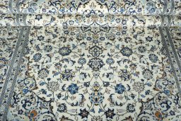 Close-up detail of 2000s Kashan rug from Iran / Persia showing Wool weave
