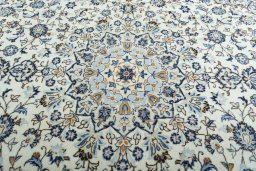 Central medallion detail of 2000s Kashan rug from Iran / Persia