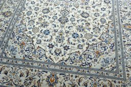 Close-up detail of 2000s Kashan rug from Iran / Persia showing Wool weave