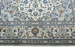 Full view of 2000s Kashan rug from Iran / Persia, 302 × 200 cm in Beige tones