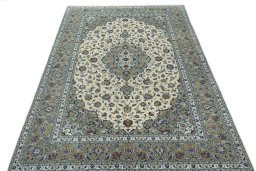 Surface texture of 2000s Kashan rug with natural Cork and intricate pattern