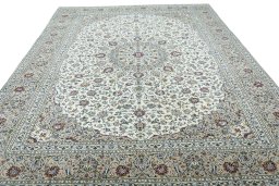Surface texture of 2000s Kashan rug with natural Wool and intricate pattern