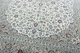 Close-up detail of 2000s Kashan rug from Iran / Persia showing Wool weave