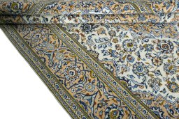 Close-up detail of 2000s Kashan rug from Iran / Persia showing Wool weave