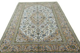 Surface texture of 2000s Kashan rug with natural Wool and intricate pattern