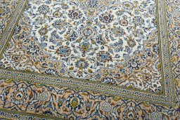 Close-up detail of 2000s Kashan rug from Iran / Persia showing Wool weave