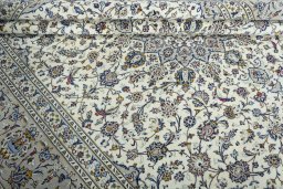 Close-up detail of 2000s Kashan rug from Iran / Persia showing Wool weave