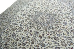 Backside of handmade 2000s Kashan rug showing knot structure and weave density