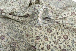 Surface texture of 2000s Kashan rug with natural Wool and intricate pattern