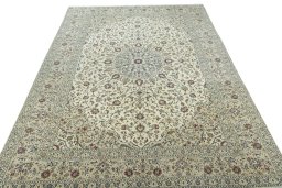 Surface texture of 2000s Kashan rug with natural Wool and intricate pattern