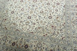Close-up detail of 2000s Kashan rug from Iran / Persia showing Wool weave