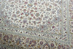 Close-up detail of 2000s Kashan rug from Iran / Persia showing Wool weave