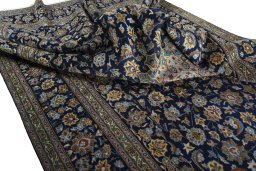 Surface texture of 1970s Kashan rug with natural Wool and intricate pattern