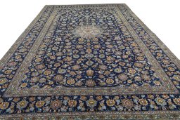 Surface texture of 1970s Kashan rug with natural Wool and intricate pattern