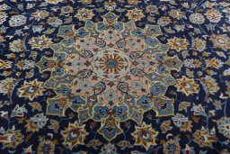 Central medallion detail of 1970s Kashan rug from Iran / Persia
