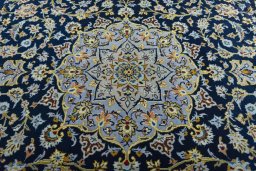 Central medallion detail of 2000s Kashan rug from Iran / Persia