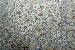 Close-up detail of 2000s Kashan rug from Iran / Persia showing Wool weave