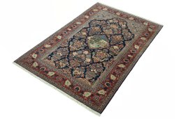 Corner detail of 1930s Kashan rug showing border pattern and Wool pile