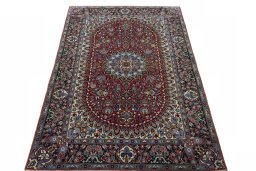 Surface texture of 2000s Kashan rug with natural Cork and intricate pattern
