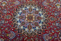 Central medallion detail of 2000s Kashan rug from Iran / Persia