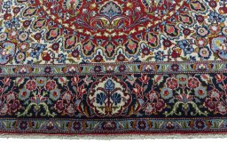 Full view of 2000s Kashan rug from Iran / Persia, 218 × 136 cm in Red tones