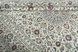 Close-up detail of 2000s Kashan rug from Iran / Persia showing Wool weave