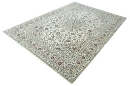 Corner detail of 2000s Kashan rug showing border pattern and Wool pile