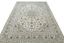 Surface texture of 2000s Kashan rug with natural Wool and intricate pattern