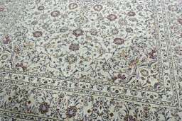 Close-up detail of 2000s Kashan rug from Iran / Persia showing Wool weave