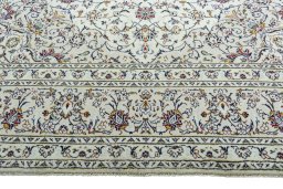 Full view of 2000s Kashan rug from Iran / Persia, 350 × 250 cm in Beige tones