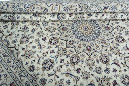 Close-up detail of 2000s Kashan rug from Iran / Persia showing Wool weave