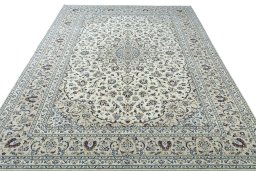 Surface texture of 2000s Kashan rug with natural Wool and intricate pattern
