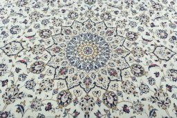 Central medallion detail of 2000s Kashan rug from Iran / Persia