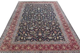 Surface texture of 2000s Kashan rug with natural Wool and intricate pattern