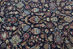 Central medallion detail of 2000s Kashan rug from Iran / Persia