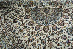 Close-up detail of 2000s Kashan rug from Iran / Persia showing Wool weave